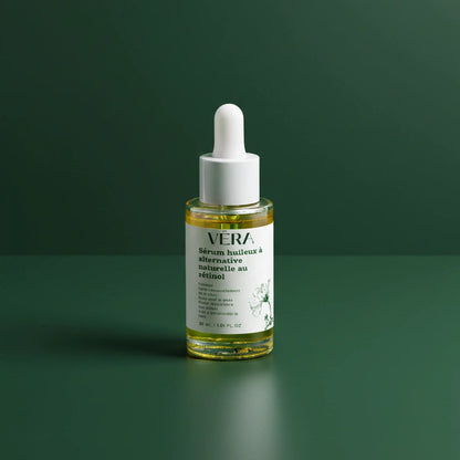 Flacon VERA sérum huileux à alternative naturelle au rétinol 30 ml sur fond vert dégradé.